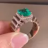 6ct Emerald Cut Emerald Halo Paved Cocktail Ring