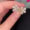 7.5ct Pear Cut White Sapphire Flower Stud Earrings in Gold