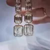 11.9ctw Emerald Cut White Sapphire Drop Earrings in Gold