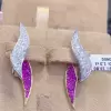 Round Cut Ruby & White Sapphire Fashion Stud Earrings