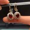 Oval Cut Garnet/Amethyst Drop Earrings In Gold