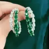 26ctw Intertwined White Sapphire and Emerald Hoop Earrings