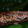 Pear Cut Rainbow Sapphire Hoop Earrings