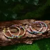 Pear Cut Rainbow Sapphire Hoop Earrings