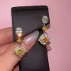 Double Halo Oval Cut Yellow Sapphire Drop Earrings