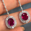 Vintage Halo Oval Cut Ruby Drop Earrings