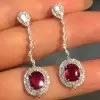 Vintage Halo Oval Cut Ruby Drop Earrings