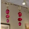 20ctw Oval Cut Ruby Gold Tone Drop Earrings