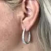 4ctw White Sapphire Paved Inside-out Oval Hoop Earrings