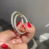Round Cut White Sapphire Paved Hoop Earrings in Gold
