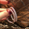 Round Cut White Sapphire Hoop Earrings in Rose Gold