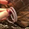 Round Cut White Sapphire Hoop Earrings in Rose Gold