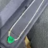 White Sapphire Tennis Necklace with Heart Emerald Pendant