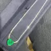 White Sapphire Tennis Necklace with Heart Emerald Pendant