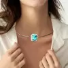 11ct Halo Cushion Cut Blue Paraiba Torque Necklace