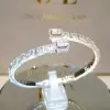 Two-tone Emerald & Round Cut Open Bracelet