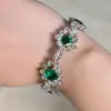 32ctw Princess cut Emerald Two Tone Flower Bracelet