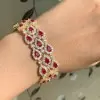 30ctw Halo Pear Cut Ruby Statement Bracelet