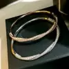 6ctw White Sapphire Paved Twist Mobius Bangle