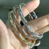 6ctw White Sapphire Paved Twist Mobius Bangle