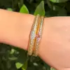 Flush Set White and Pink Sapphire Clustered Bangle