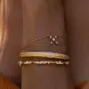 Flush Set White and Pink Sapphire Clustered Bangle