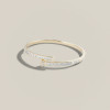 5.5ctw Multi-cut Emerald and White Sapphire Bypass Bangle