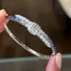 8ctw Gradient Blue and White Sapphire Bypass Bangle