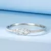 5ctw Baguette and Round Cut White Sapphire Infinity Bangle