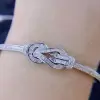 5ctw Baguette and Round Cut White Sapphire Infinity Bangle