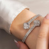 5ctw Baguette Cut White Sapphire Bypass Clover Bangle
