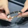 4.5ctw White and Black Sapphire Paved Bamboo Bangle