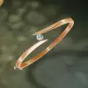 Bezel Set Round Cut Simple Modern Bypass Bangle