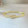 2ctw Round Cut Gold Tone Bypass Bangle Bracelet