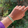18ctw Oval and Pear Cut Emerald Paved Statement Bangle