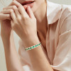 18ctw Oval and Pear Cut Emerald Paved Statement Bangle