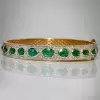 18ctw Oval and Pear Cut Emerald Paved Statement Bangle