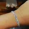 14ctw Round and Baguette Cut Intertwined Infinity Bracelet