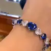 East West Heart Cut Blue Sapphire Bracelet