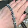 Flower Design Round Cut Emerald Bracelet