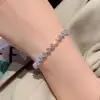 12ctw Heart Cut White Sapphire Tennis Bracelet in Rose Gold
