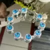 11.5ctw Halo Round Cut Aquamarine Bracelet