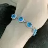 11.5ctw Halo Round Cut Aquamarine Bracelet