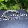 Tanzanite Blue Sapphire Twist Wedding Band