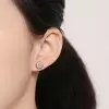 Round Cut White Sapphire Stud Earrings in Rose Gold
