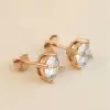 Round Cut White Sapphire Stud Earrings in Rose Gold