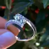 Round Cut White Sapphire Twisted Shank Engagement Ring