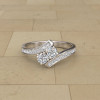 Round Cut White Sapphire Twisted Shank Engagement Ring