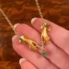 Pear Cut Emerald Vintage Love Hands Pendant Necklace