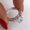 3.15ct Oval Cut Engagement Ring with Two Princess Sidestones